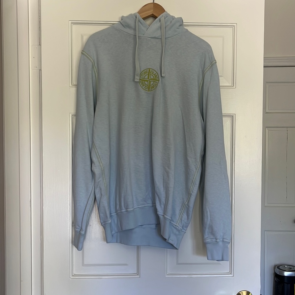 Stone Island light blue hoodie with green stitching
